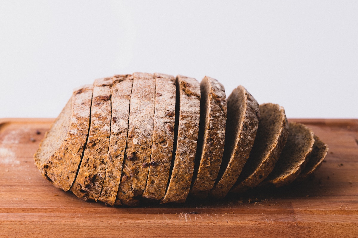 Stock photo: artisan loaves on a bakery board, illustrating traditional bread baking similar to Gunn's Bakery Winnipeg
