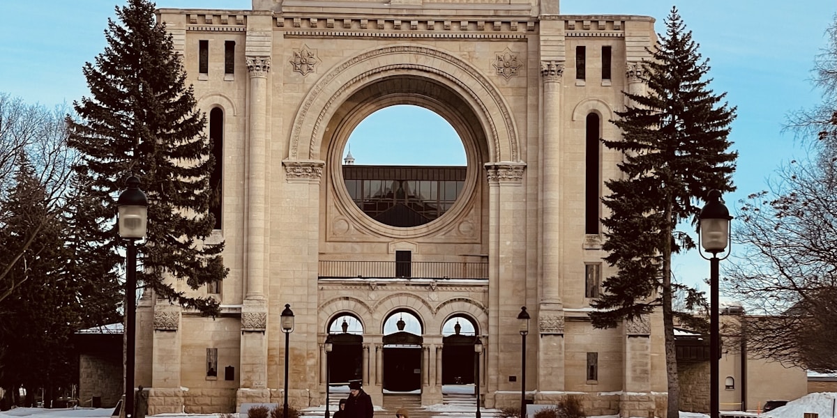 People enjoying winter activities on frozen river in Winnipeg